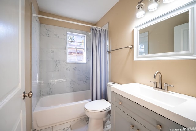 114 S San Ignacio Ave, San Antonio, TX 78237 - bathroom featuring toilet, marble finish floor, shower / bath combo with shower curtain, and vanity