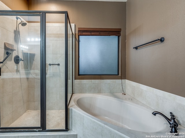 bathroom with independent shower and bath