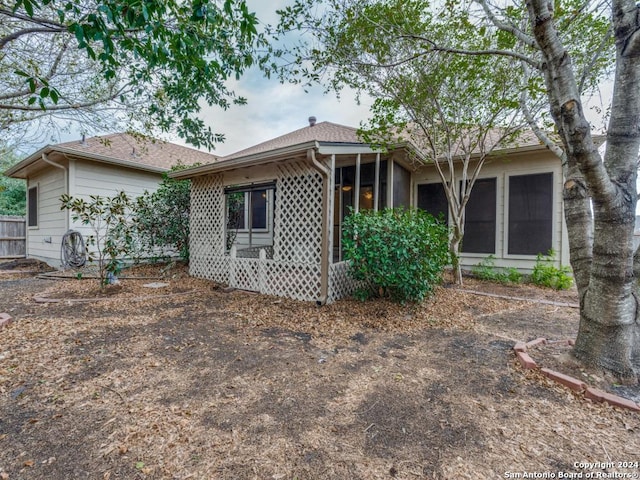 2222 Garden Gate, New Braunfels, TX 78130 - back of property with a sunroom