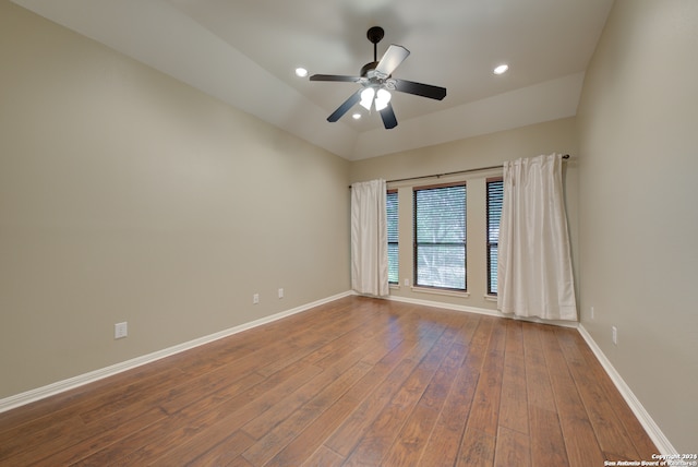 empty room featuring ceiling fan and hardwood / wood-style flooring