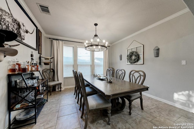 4815 Isaac Ryan, San Antonio, TX 78253 - dining area featuring visible vents, baseboards, a notable chandelier, ornamental molding, and light tile patterned flooring