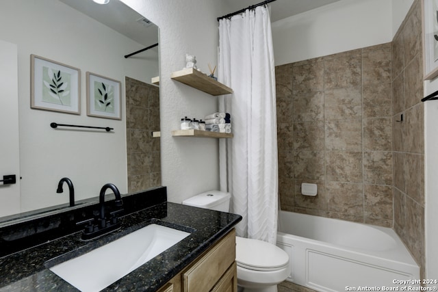 full bathroom featuring vanity, toilet, and shower / bath combo