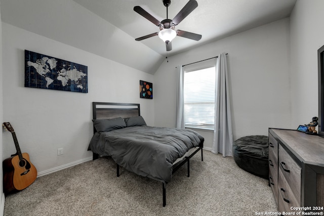 carpeted bedroom featuring ceiling fan and lofted ceiling