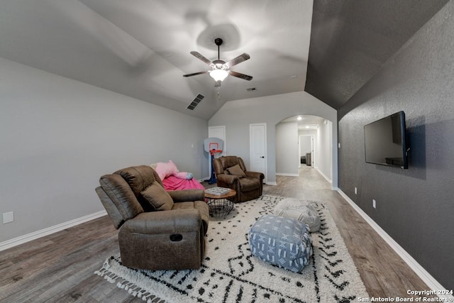 4815 Isaac Ryan, San Antonio, TX 78253 - living area featuring a ceiling fan, visible vents, arched walkways, wood finished floors, and lofted ceiling