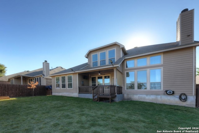 4815 Isaac Ryan, San Antonio, TX 78253 - back of property featuring a yard, a ceiling fan, fence, and a chimney