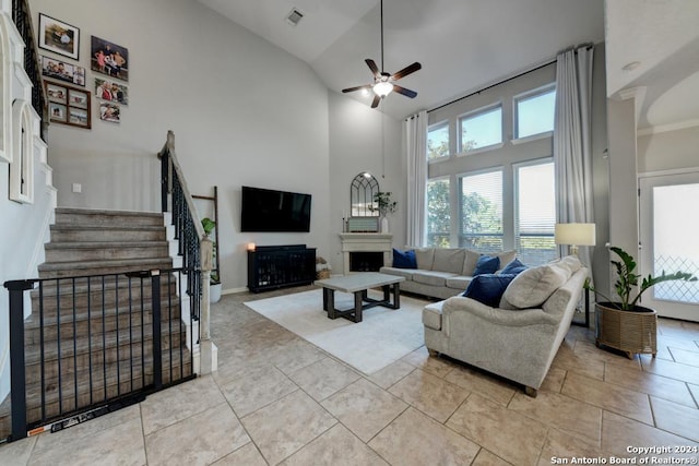 4815 Isaac Ryan, San Antonio, TX 78253 - living room featuring a healthy amount of sunlight, high vaulted ceiling, ceiling fan, and a fireplace