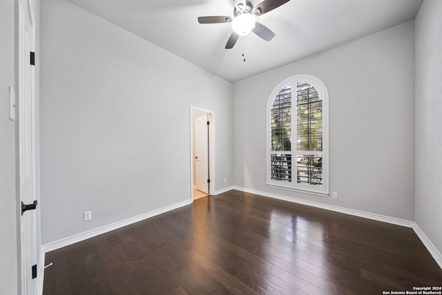 empty room featuring hardwood / wood-style flooring and ceiling fan