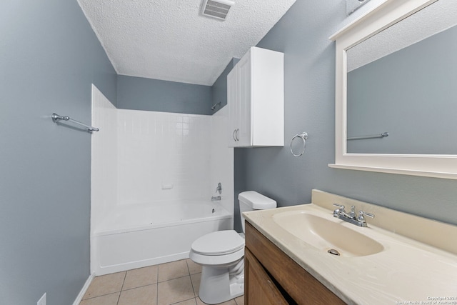 full bathroom featuring vanity, tile patterned floors,  shower combination, toilet, and a textured ceiling