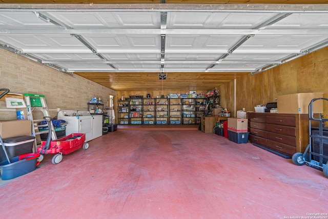 garage featuring washer and dryer