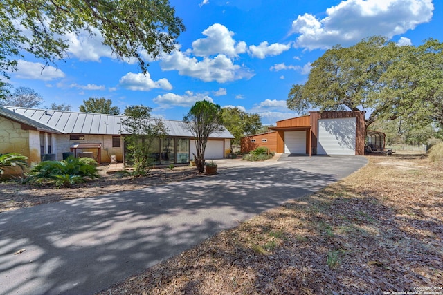 ranch-style home with a garage