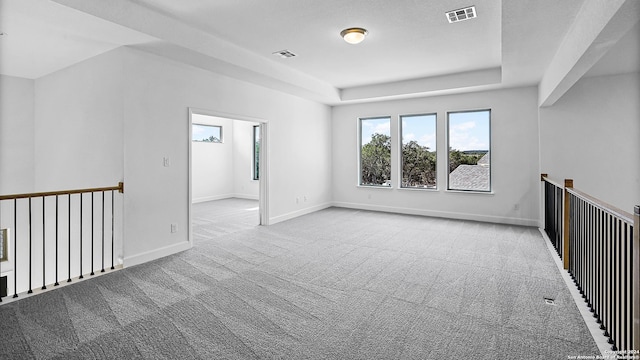 empty room featuring light colored carpet