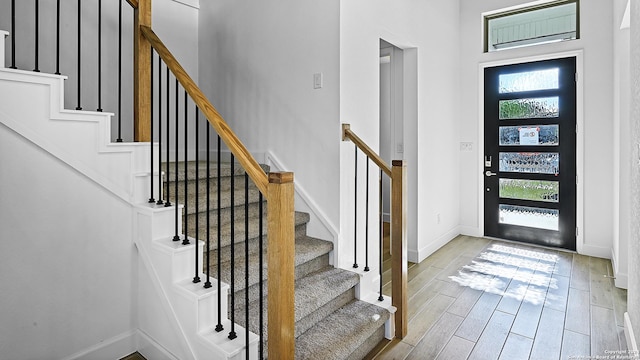 entryway with light hardwood / wood-style floors