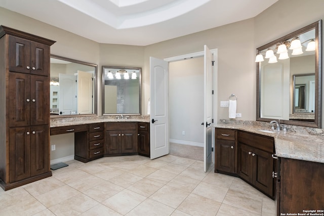 bathroom featuring tile patterned floors and vanity