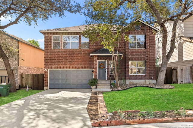 view of front facade with a garage and a front yard