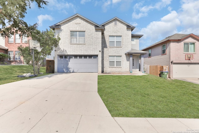 view of front of house featuring a front lawn and a garage