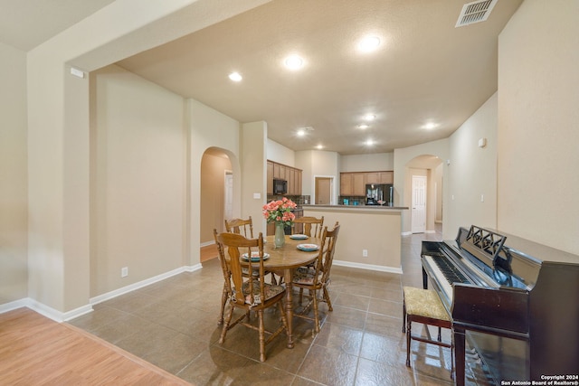 dining room featuring light hardwood / wood-style flooring