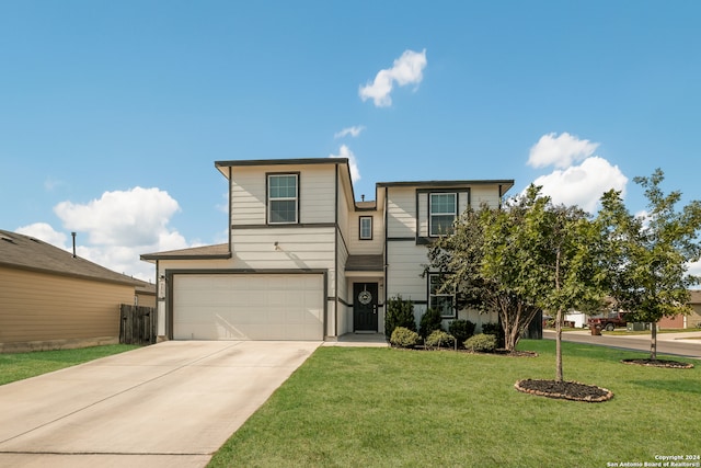 view of front of house with a garage and a front lawn