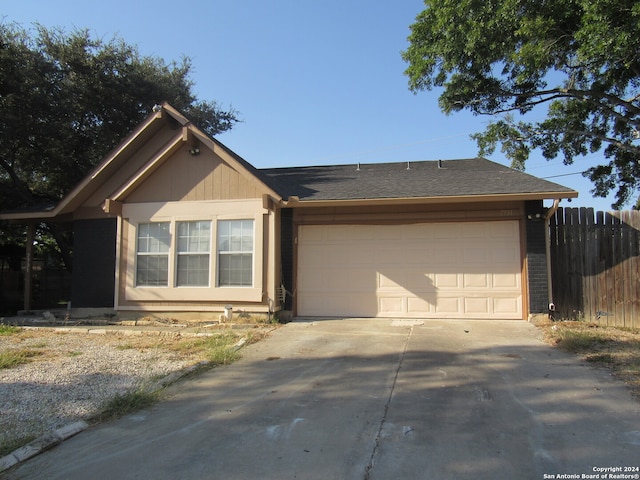 single story home featuring a garage