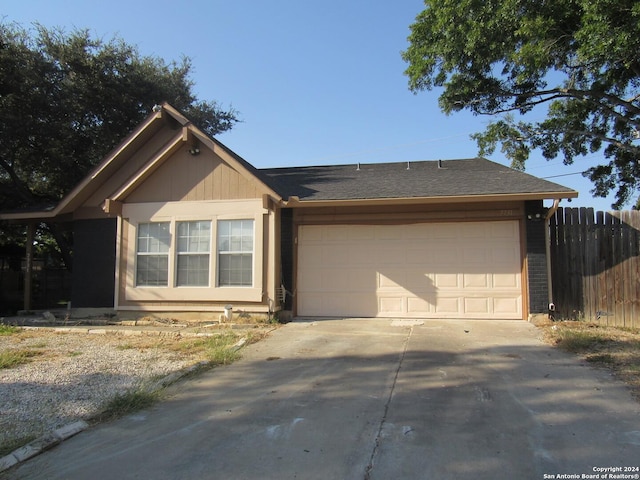7731 Clear Ridge Dr, San Antonio, TX 78239 - ranch-style home featuring fence, driveway, and a garage