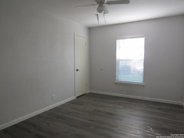 7731 Clear Ridge Dr, San Antonio, TX 78239 - spare room with baseboards, wood finished floors, and ceiling fan