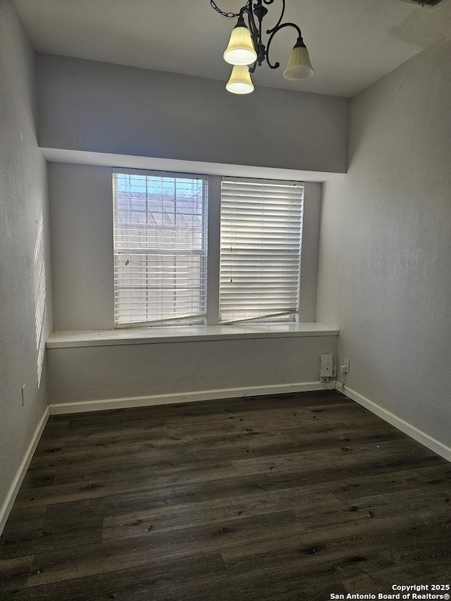 7731 Clear Ridge Dr, San Antonio, TX 78239 - unfurnished dining area with baseboards and dark wood-type flooring