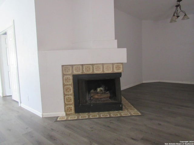 7731 Clear Ridge Dr, San Antonio, TX 78239 - interior details with a fireplace with flush hearth, baseboards, and wood finished floors