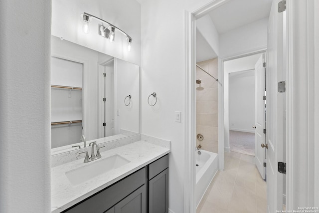 bathroom featuring shower / bath combination with curtain, tile patterned flooring, and vanity