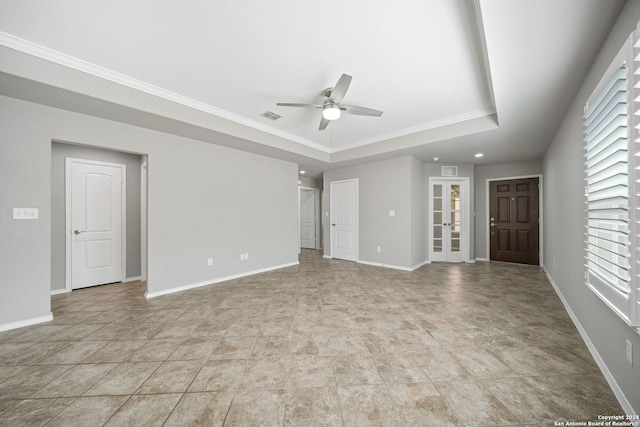 interior space with ceiling fan, ornamental molding, and a healthy amount of sunlight