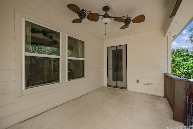 view of patio featuring ceiling fan