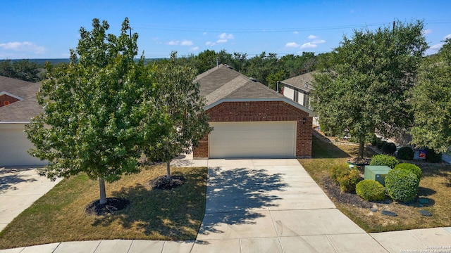 obstructed view of property featuring a garage