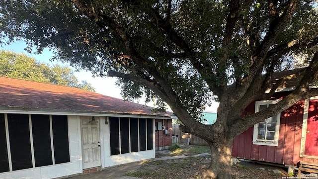 view of yard featuring a sunroom