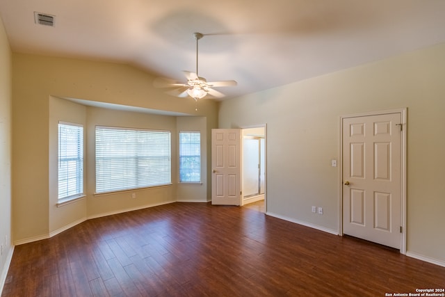 unfurnished room with ceiling fan and dark hardwood / wood-style floors