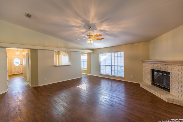 unfurnished living room featuring a fireplace, ceiling fan, vaulted ceiling, and dark hardwood / wood-style floors