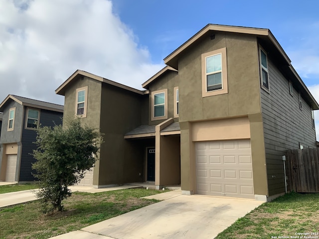 front of property featuring a garage