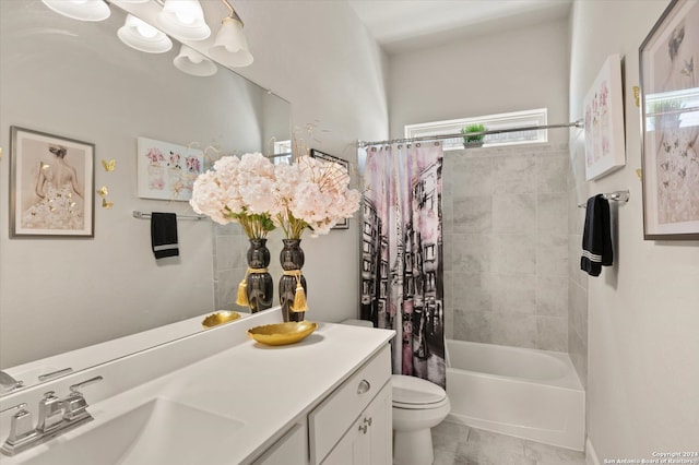 full bathroom featuring vanity, toilet, and shower / tub combo with curtain