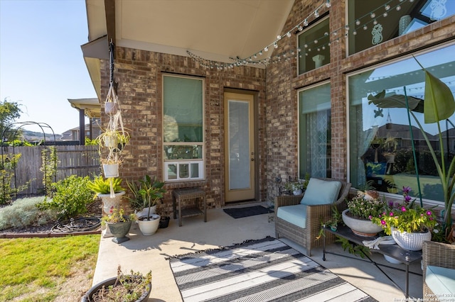 property entrance featuring a patio