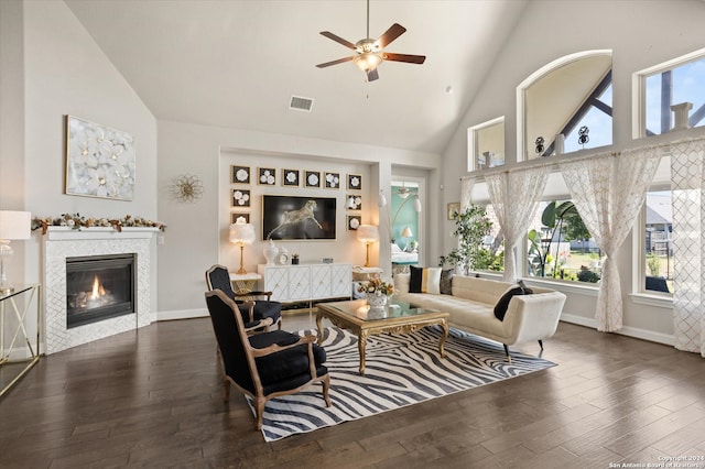 living room with high vaulted ceiling, ceiling fan, and dark hardwood / wood-style floors