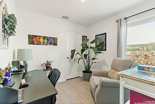 home office featuring light hardwood / wood-style floors