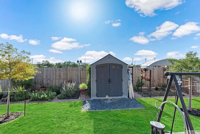 view of outbuilding featuring a lawn