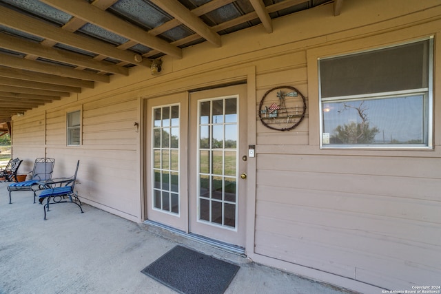 property entrance with a patio