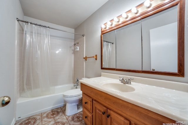 full bathroom with vanity, toilet, and shower / bath combo