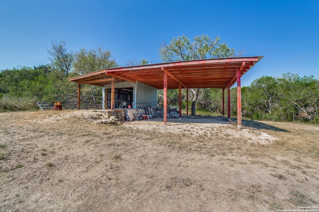 view of community featuring an outbuilding