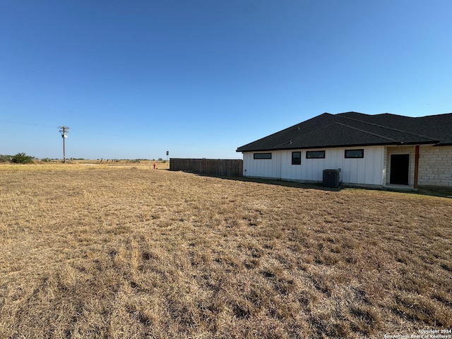 view of yard featuring central AC