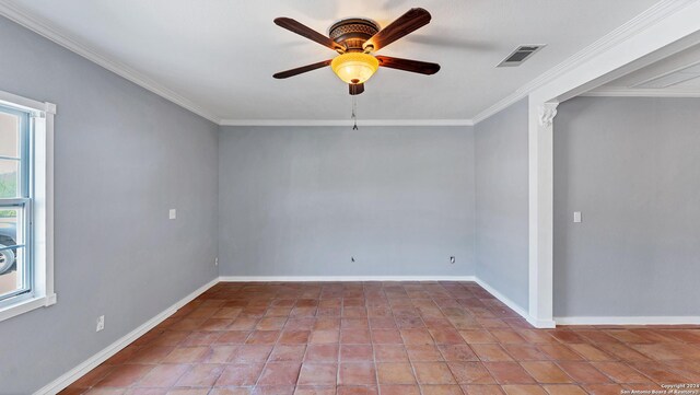 empty room with ceiling fan, baseboards, and crown molding