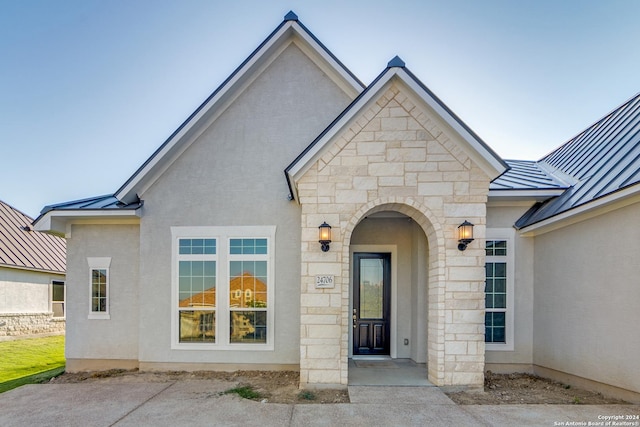 24706 Faraday, San Antonio, TX 78257 - entrance to property featuring a standing seam roof, metal roof, and stucco siding