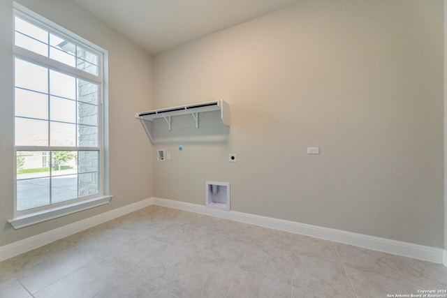 24706 Faraday, San Antonio, TX 78257 - clothes washing area with baseboards, laundry area, hookup for a gas dryer, and electric dryer hookup