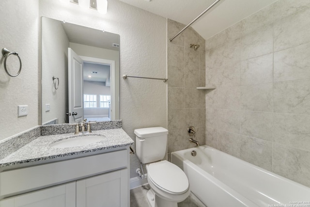 24706 Faraday, San Antonio, TX 78257 - bathroom with toilet, a textured wall, tub / shower combination, and vanity