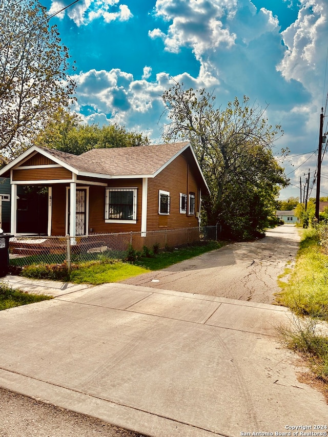 view of home's exterior featuring covered porch