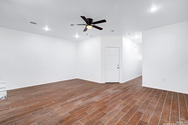 unfurnished room with hardwood / wood-style flooring and ceiling fan