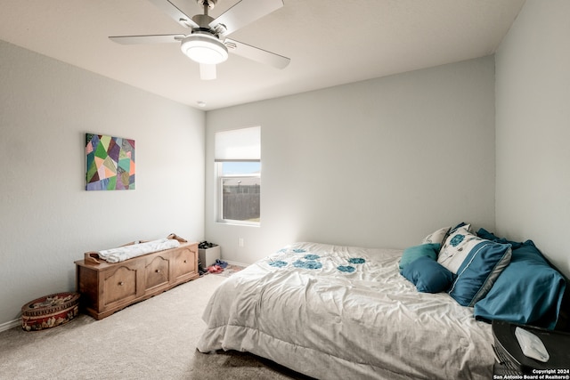 bedroom featuring ceiling fan and carpet flooring